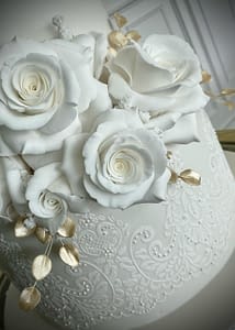Dress detail on wedding cake