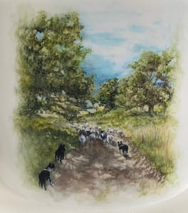 painted scene on wedding cake